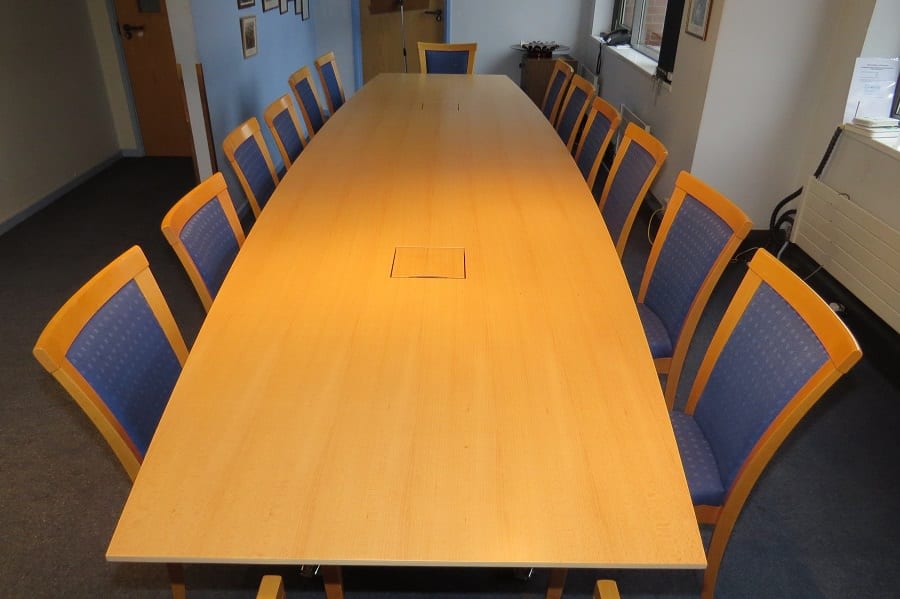 Flip-top meeting table in veneer