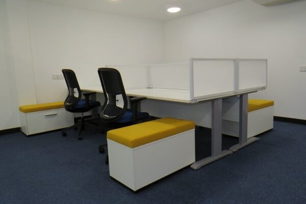 office desks with screens and pedestal seats