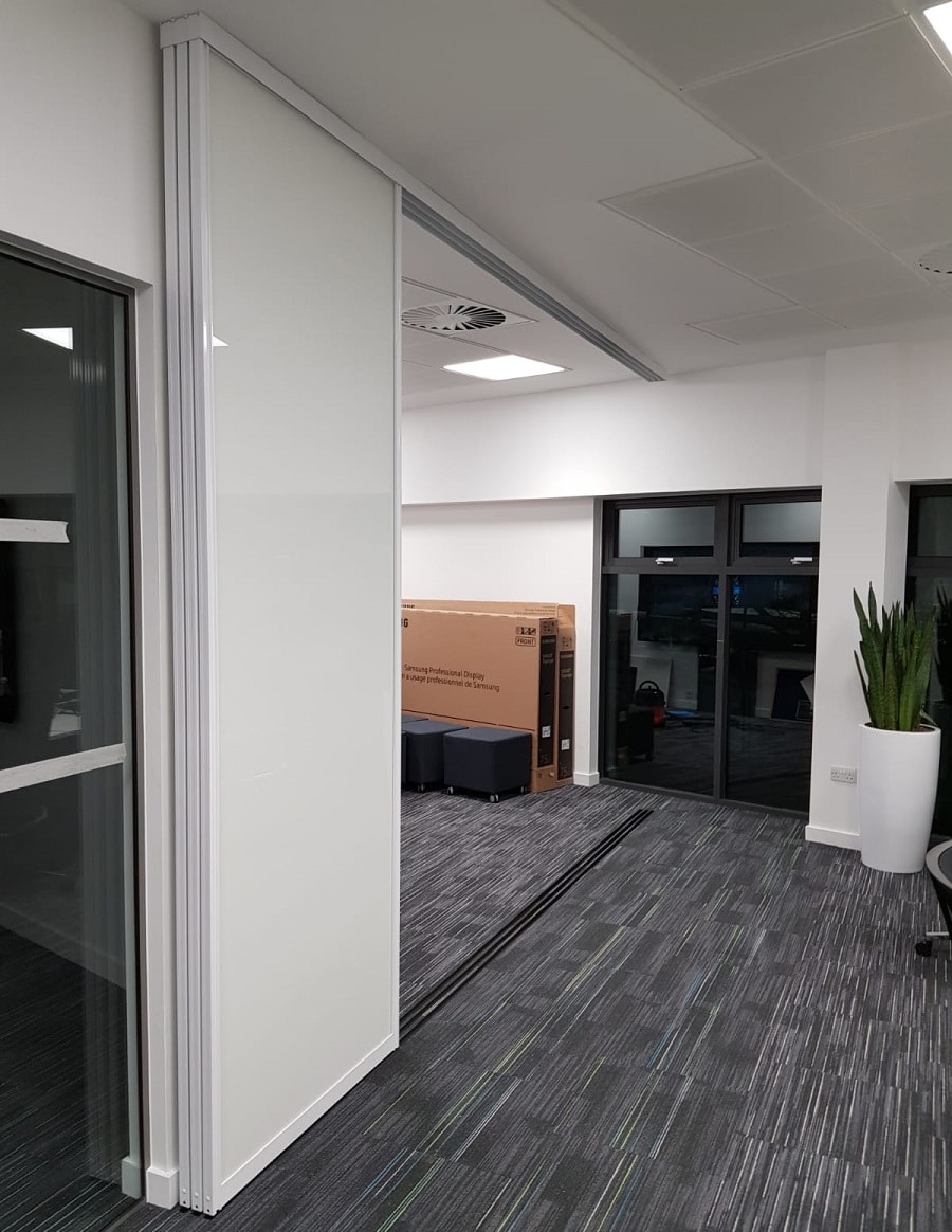 Sliding Whiteboard doors on tracks for F1 Team Fusion Office Design