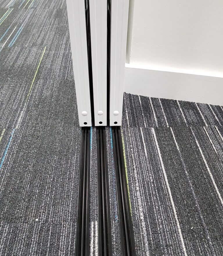 Sliding Whiteboard doors on tracks for F1 Team Fusion Office Design