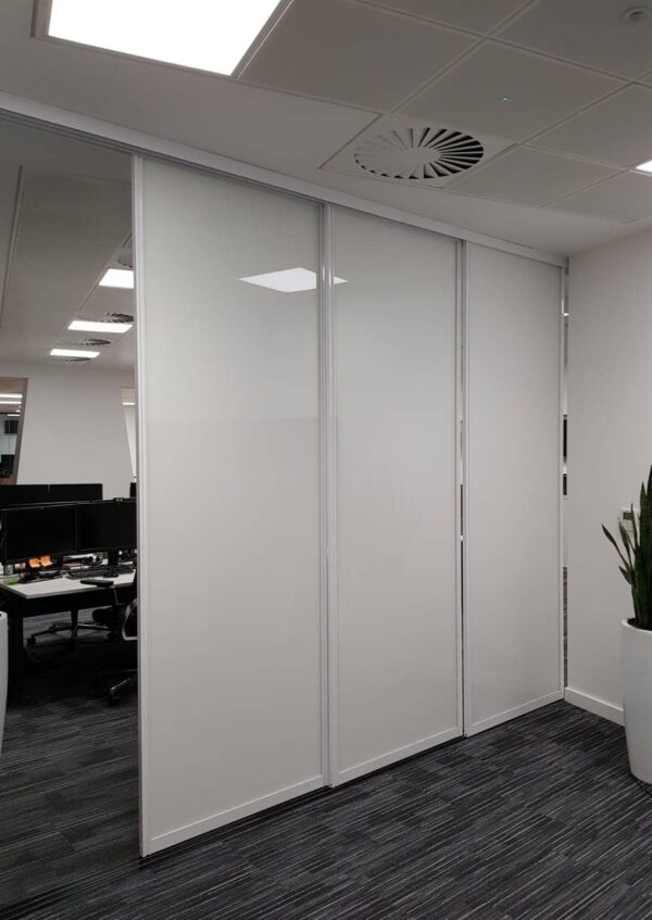 Sliding Whiteboard doors on tracks for F1 Team Fusion Office Design