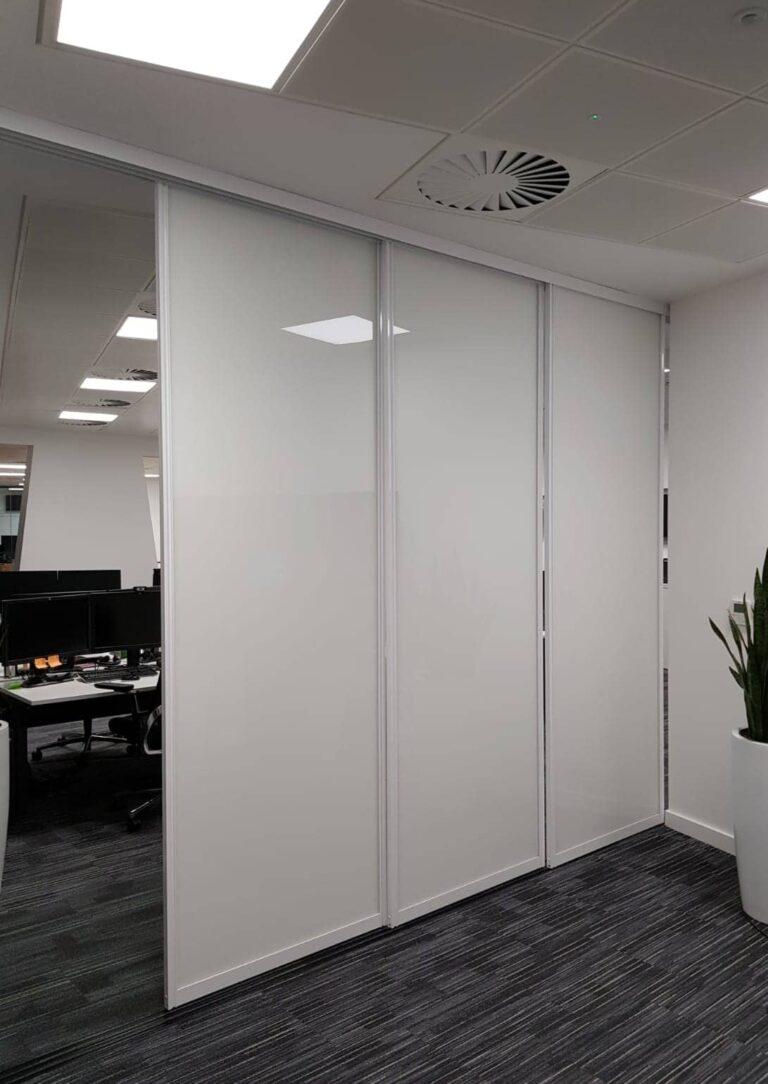 Sliding Whiteboard doors on tracks for F1 Team Fusion Office Design