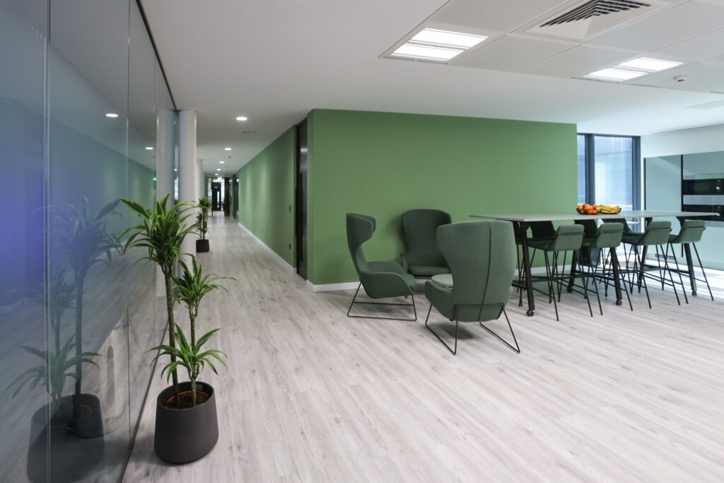 11 Ways to Reduce the Cost of an Office Refurbishment in London | Fusion Office Design Colourful office refurbishment ideas with a stand out teal shade used for the walls and upholstery