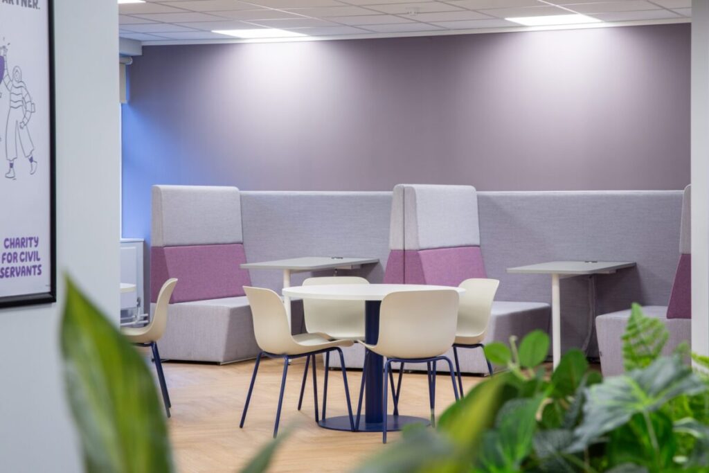 Dining booths with duo upholstery in brand colours lilac and purple