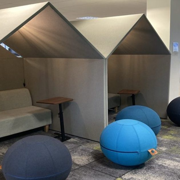 Office pods with globe seats for collaboration and informal meetings